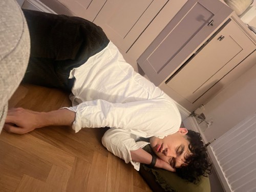Adrian passed out on the kitchen floor
